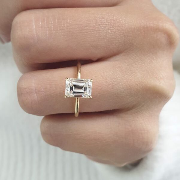 2CT Emerald Cut Solitaire Ring on model