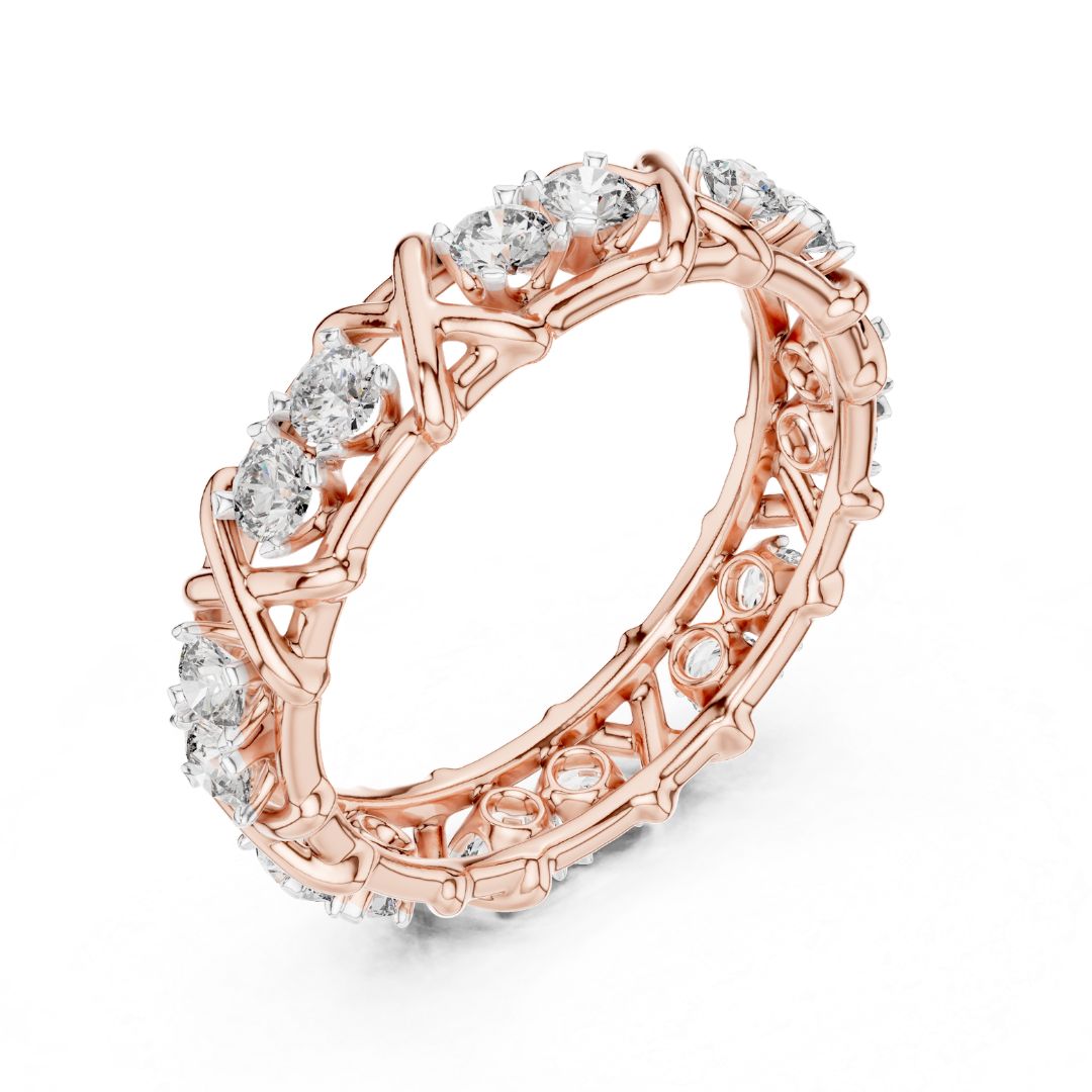 Rose gold ring with moissanite diamond accents on a white background