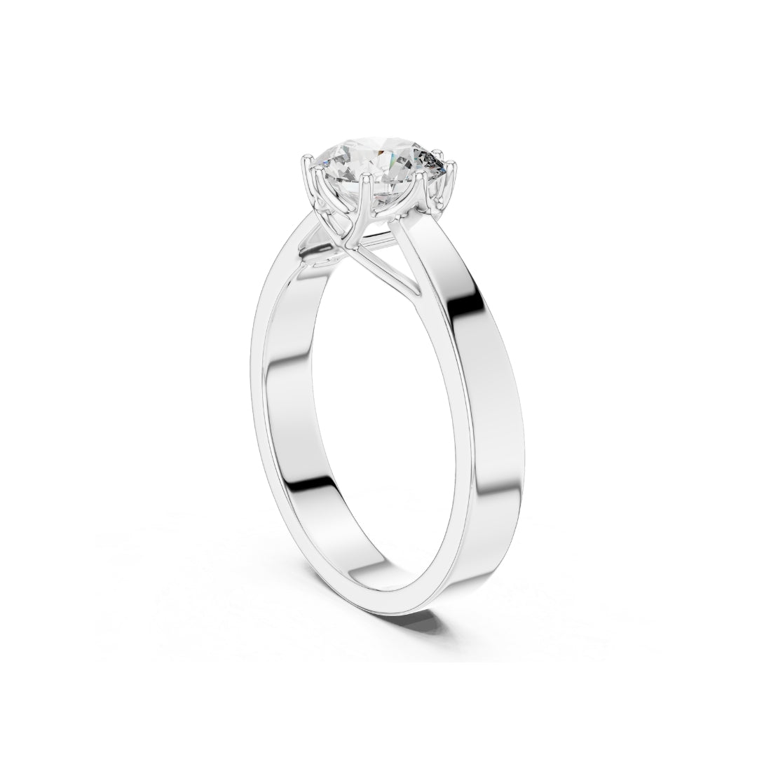 Silver ring with a 1ct moissanite diamond on a white background