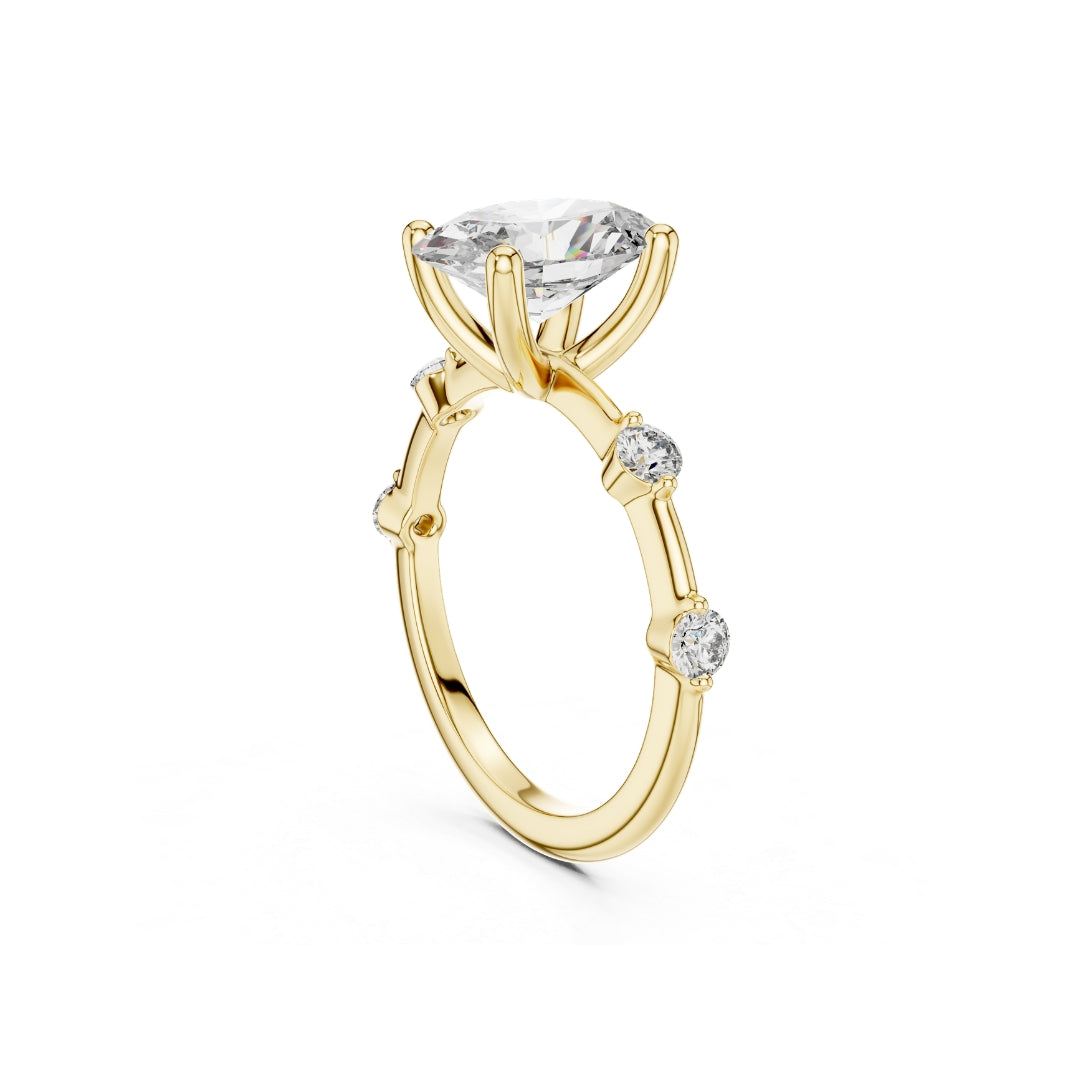 Gold MOISSANITE  ring with a large central diamond and smaller diamonds on the sides against a white background