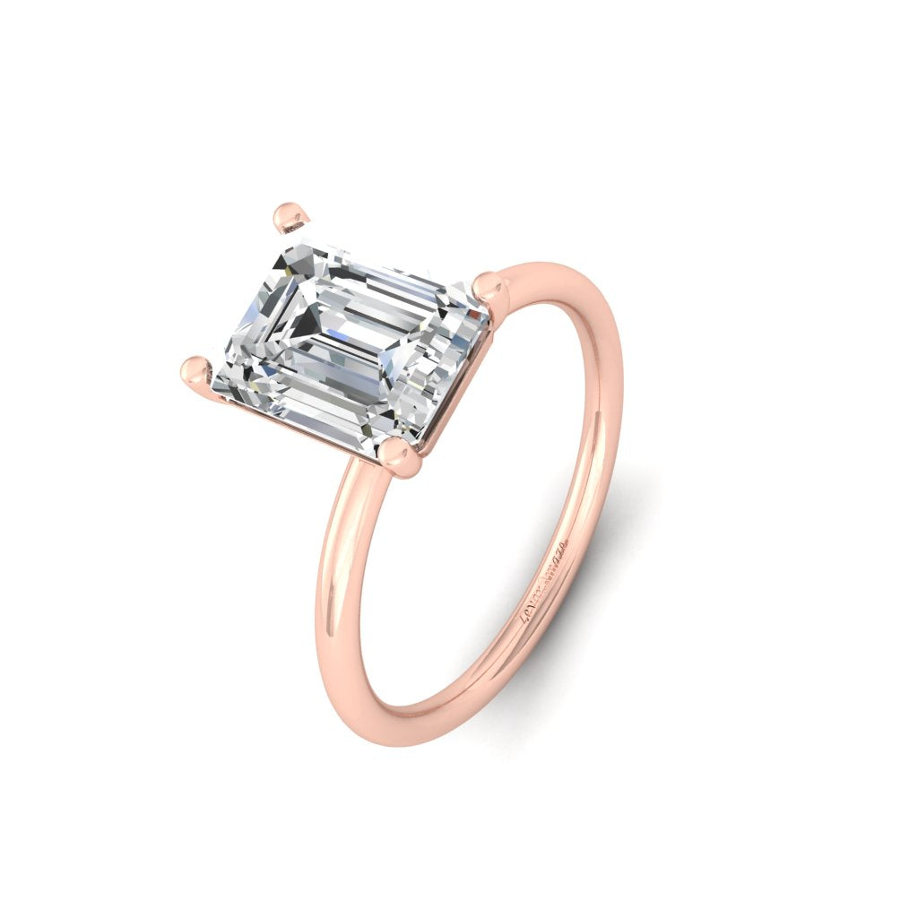 rose gold emeald solitaire ring in silver