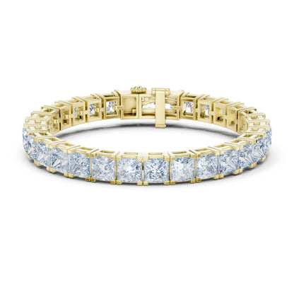Gold bracelet with moissanite diamond stones on a white background