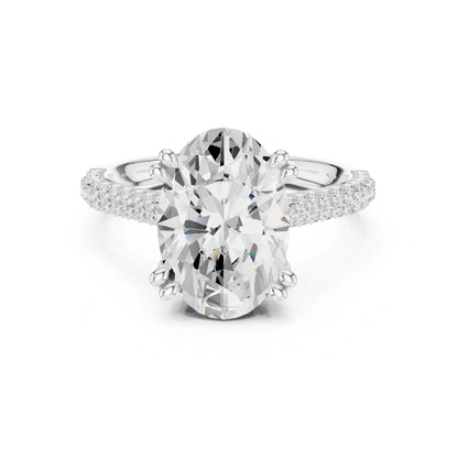 moissanite Diamond ring with a large central gemstone and smaller stones on a white background