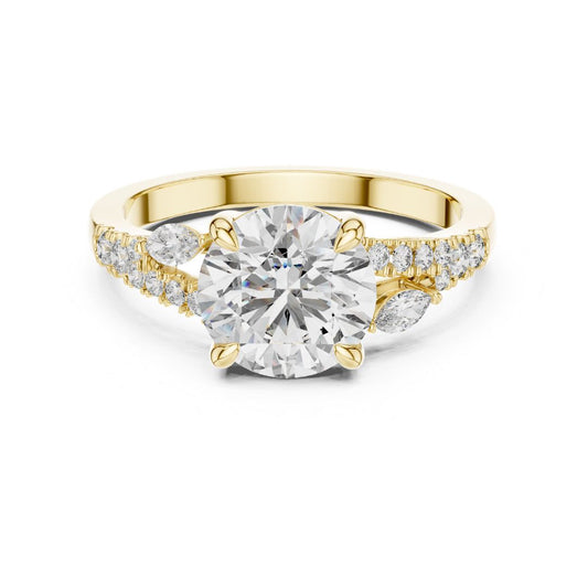 Gold and moissanite diamond ring on a white background