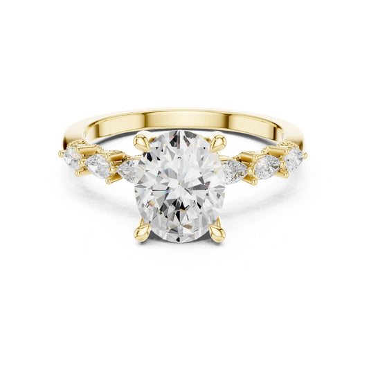 Gold ring with a large moissanite diamond and smaller diamonds on the sides against a white background