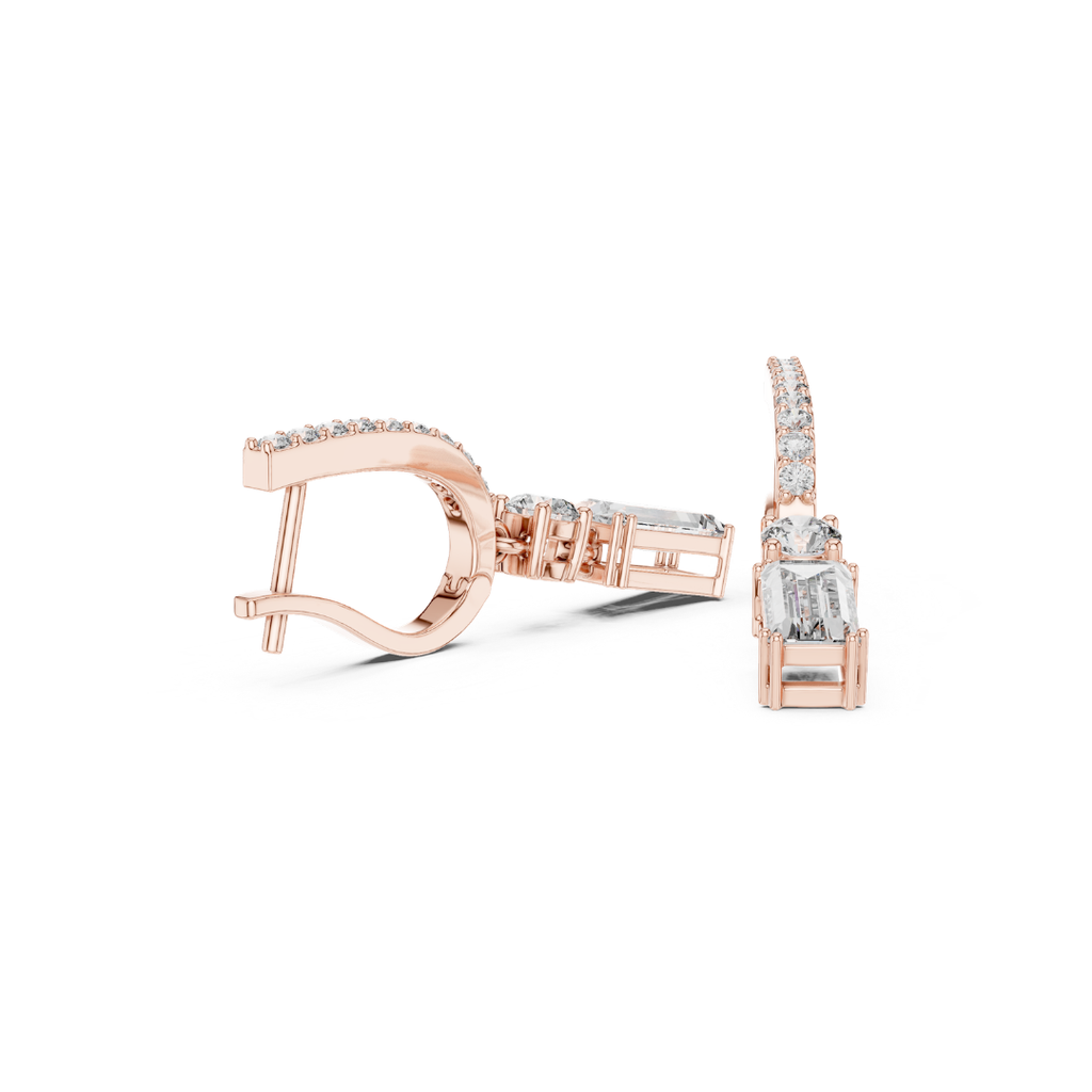 Rose gold earrings with moissanite diamond accents on a white background