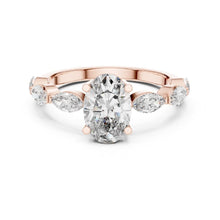 Load image into Gallery viewer, Rose gold ring with a large moissanite diamond and smaller pear-shaped diamonds on a white background