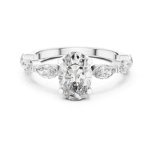 Load image into Gallery viewer, Diamond ring with a central oval-cut moissanite diamond and pear-shaped side stones on a white background