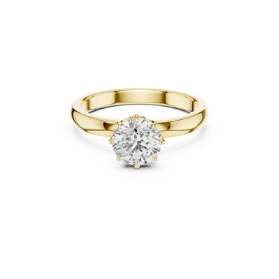 Gold ring with a 1ct moissanite diamond on a white background