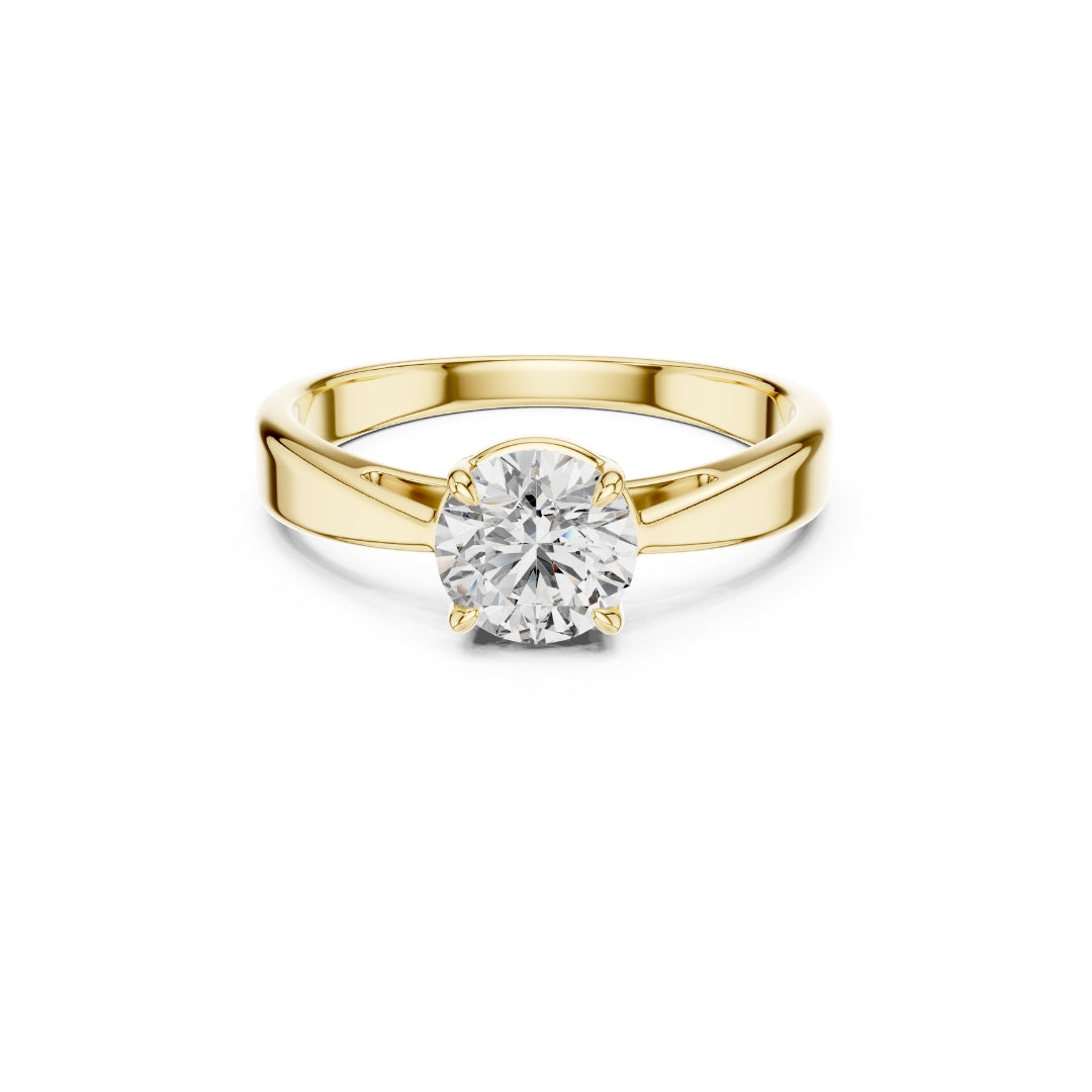 Gold ring with a 1ct moissanite diamond on a white background