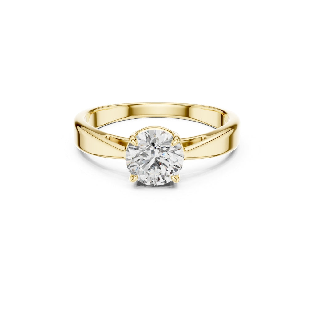 Gold ring with a 1ct moissanite diamond on a white background