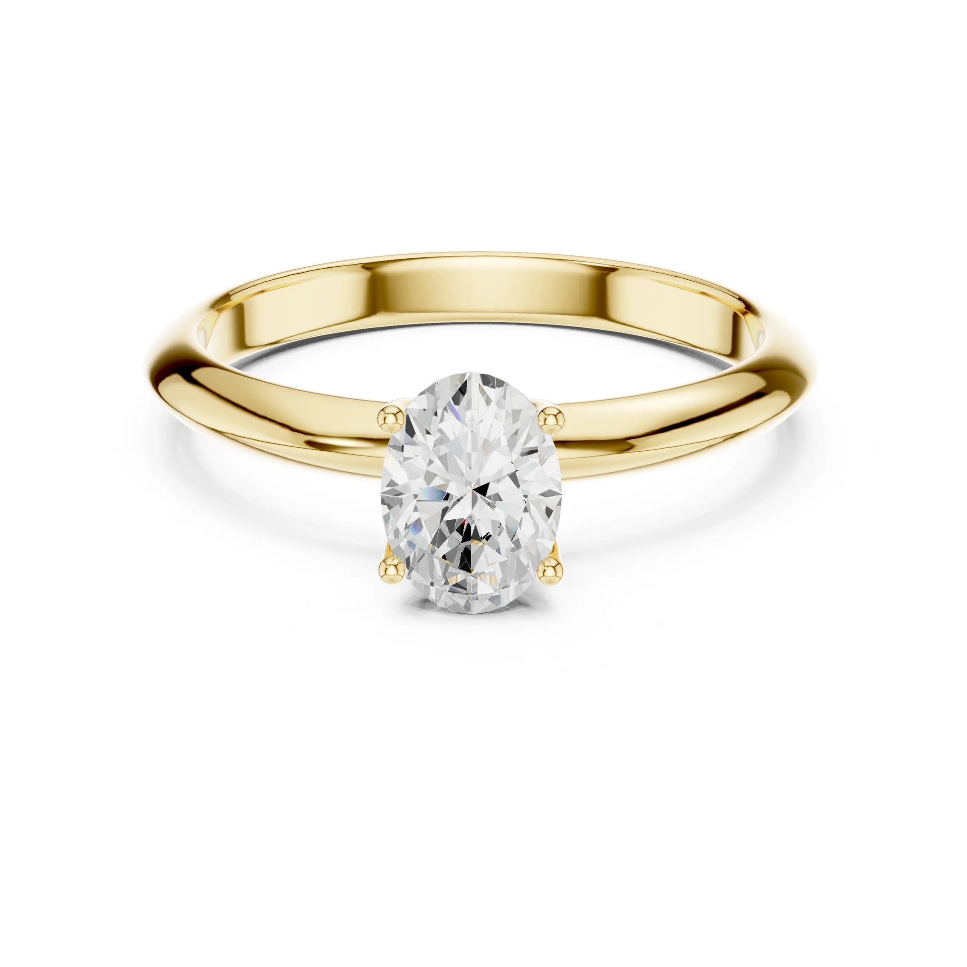Gold ring with a moissanite diamond on a white background