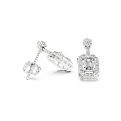 Pair of moissanite  diamond earrings on a white background
