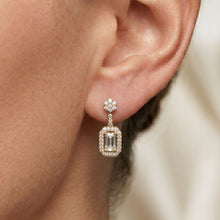 Load image into Gallery viewer, Close-up of a moissainte diamond earring worn on an ear with a blurred background