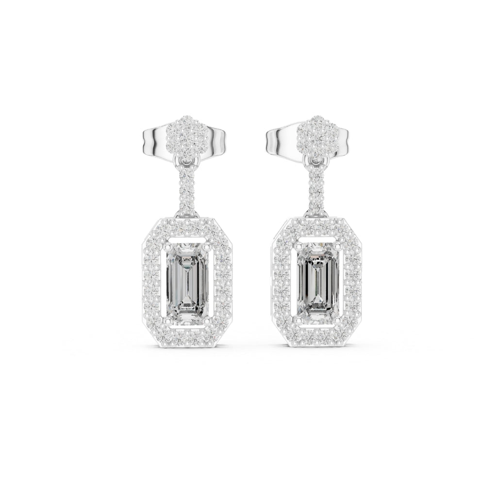 Pair of moissanite diamond earrings on a white background