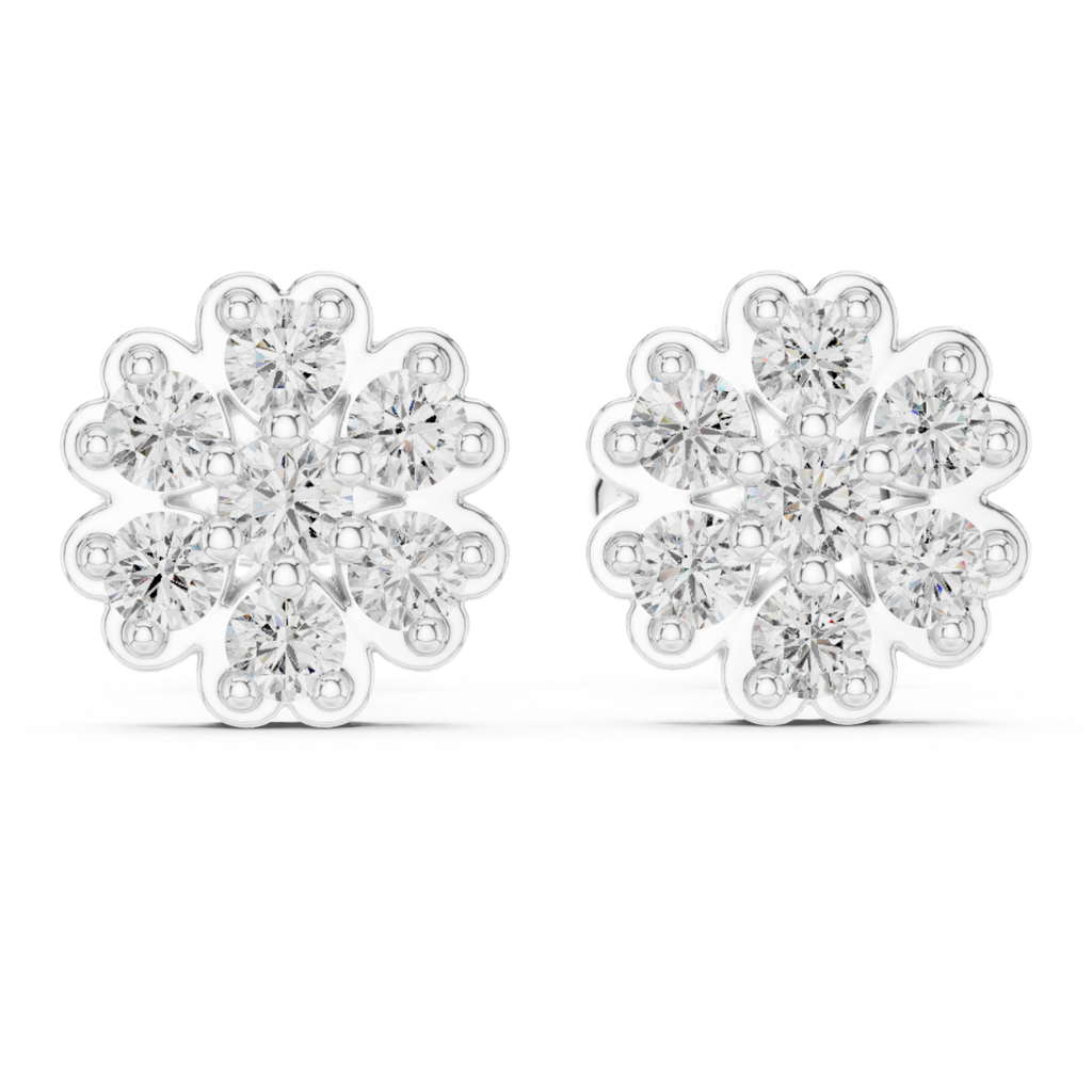 Pair of moissanite diamond snowflake earrings on a white background