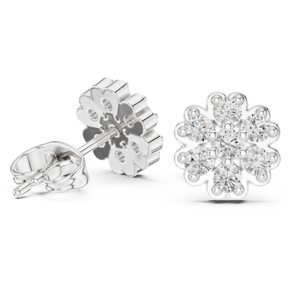 Silver snowflake moissanite diamond earrings on a white background