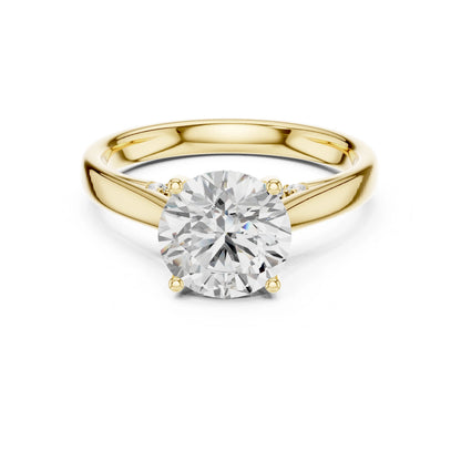 Gold ring with a large moissanite diamond on a white background