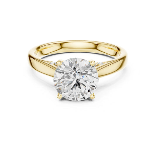 Gold ring with a large moissanite diamond on a white background