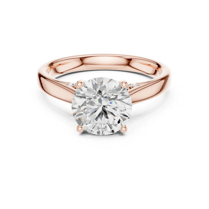 Rose gold ring with a large moissanite diamond on a white background