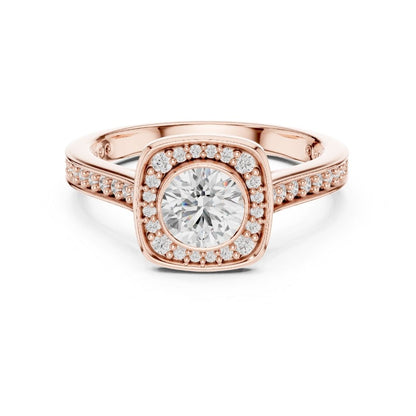 Rose gold ring with a large moissanite diamond and smaller diamonds on the band against a white background