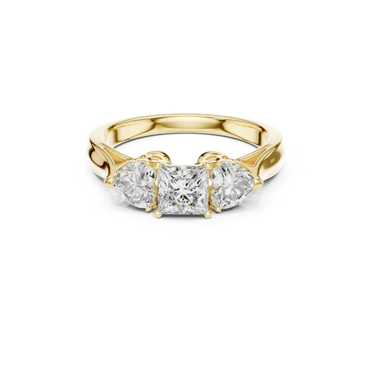 Gold ring with three Moissanite diamonds on a white background