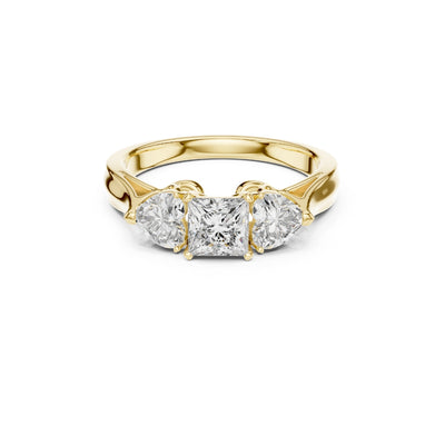 Gold ring with three Moissanite diamonds on a white background