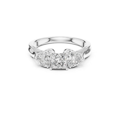 Silver ring with 3 moissanite diamonds on a white background