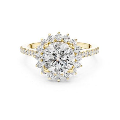 Gold and moissanite  diamond ring on a white background