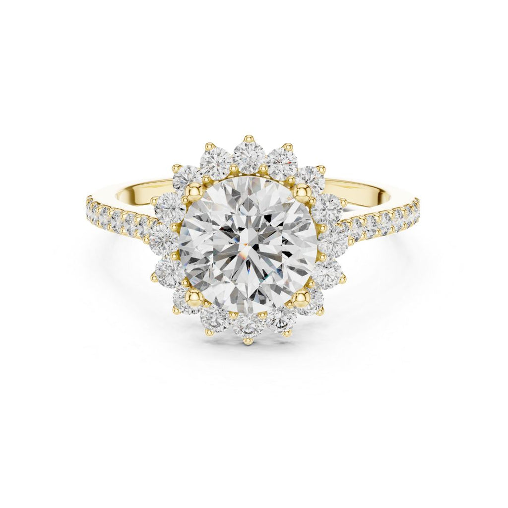 Gold and moissanite  diamond ring on a white background