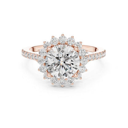 Rose gold ring with a large moissanite diamond and smaller diamonds on a white background