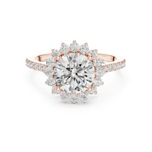 Load image into Gallery viewer, Rose gold ring with a large moissanite diamond and smaller diamonds on a white background