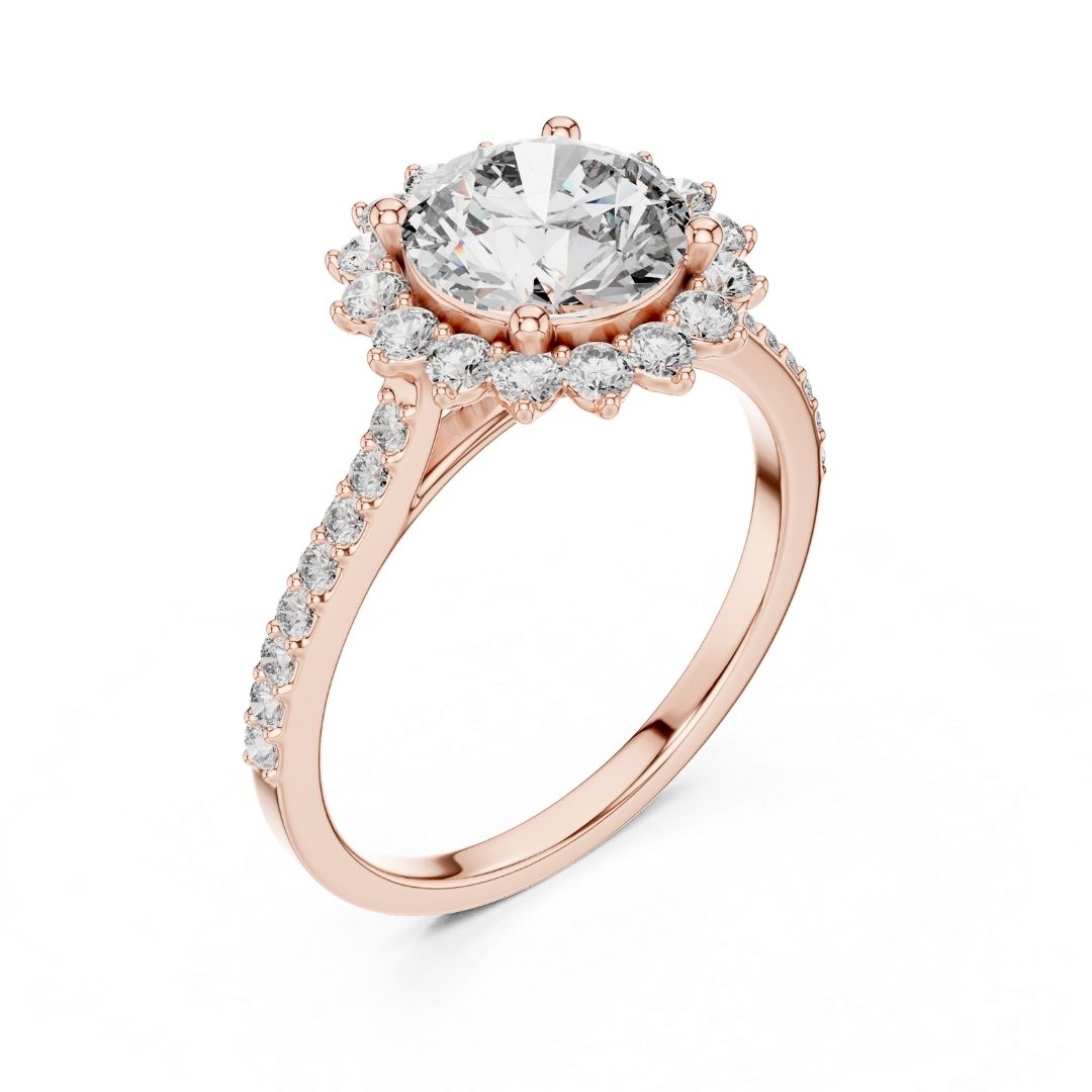 Rose gold ring with a large moissanite diamond and smaller diamonds on the band against a white background