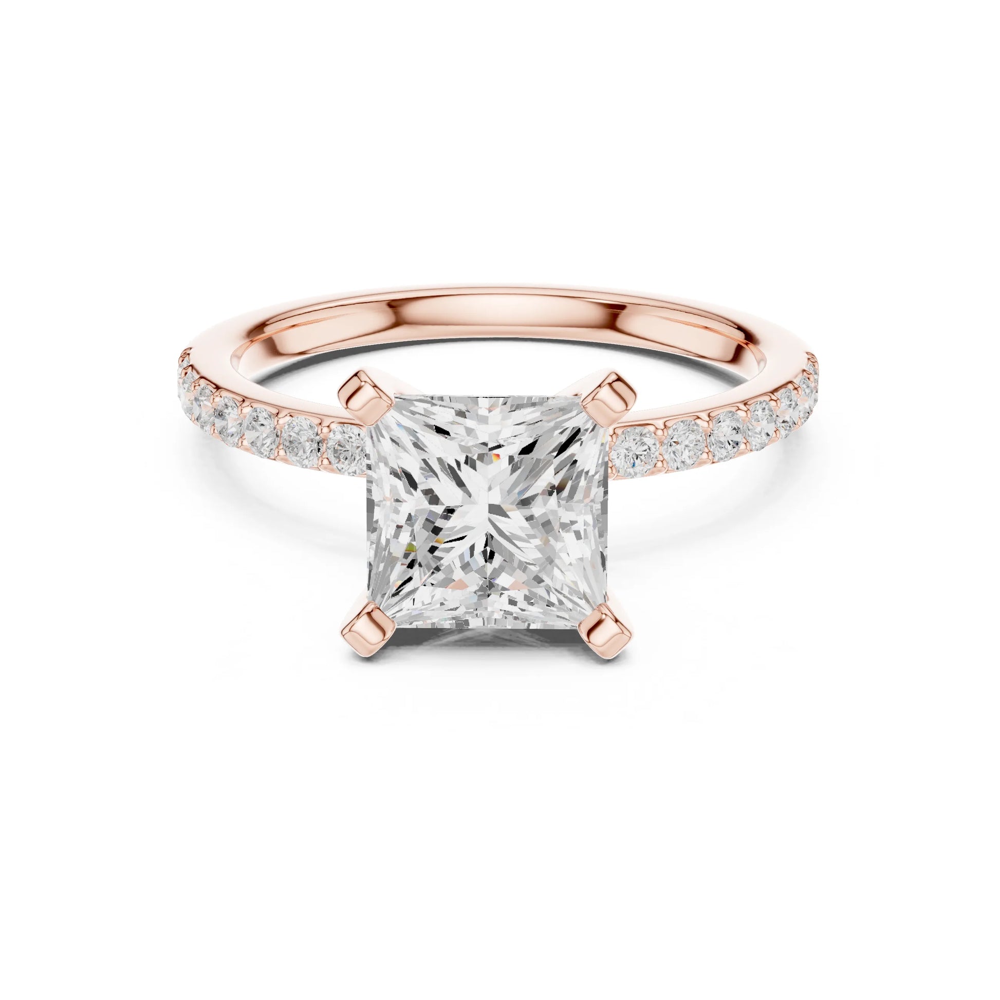 Rose gold ring with a large moissanite diamond and smaller diamonds on the band against a white background