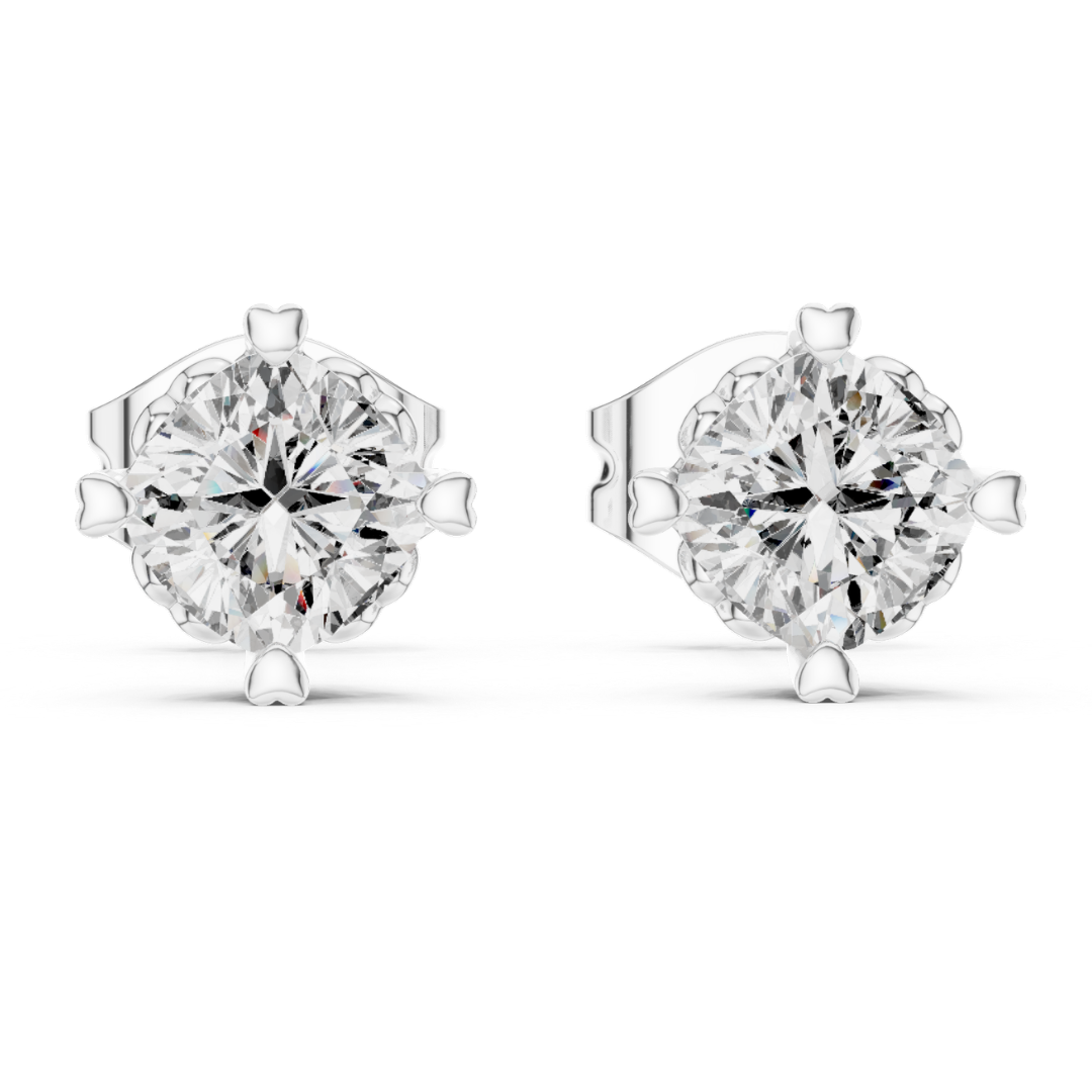 Pair of moissanite diamond stud earrings on a white background