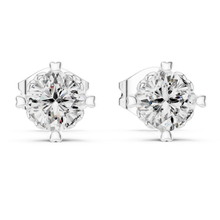 Load image into Gallery viewer, Pair of moissanite diamond stud earrings on a white background