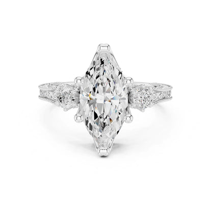 moissanite Diamond ring with a pear-shaped center stone on a white background