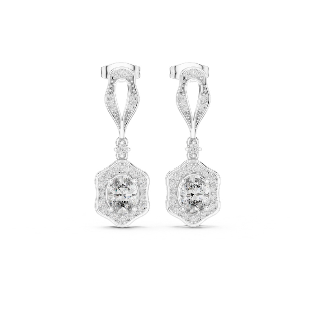 Pair of moissanite diamond earrings on a white background