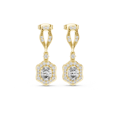 Gold earrings with clear moissanite  gemstones on a white background