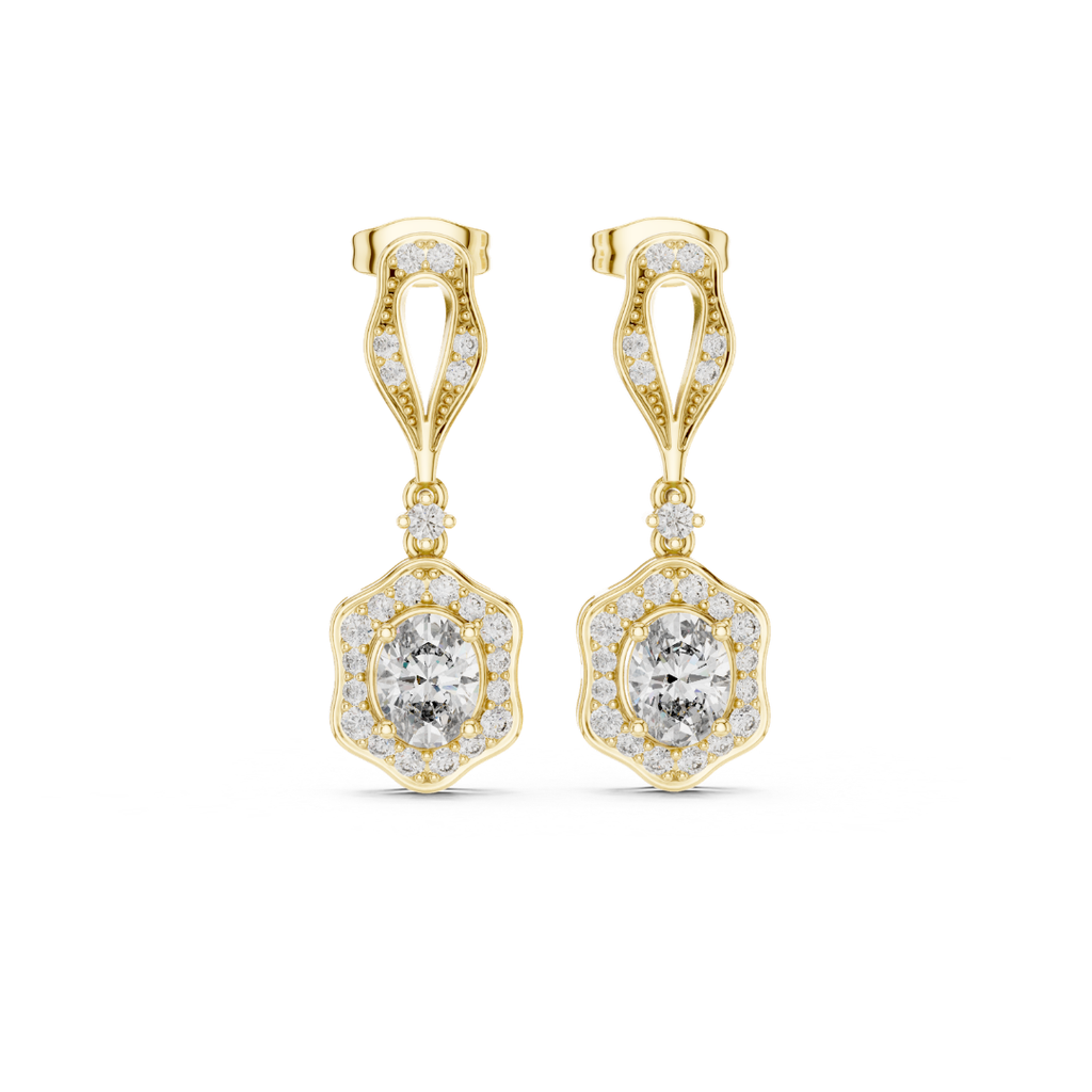 Gold earrings with clear moissanite  gemstones on a white background