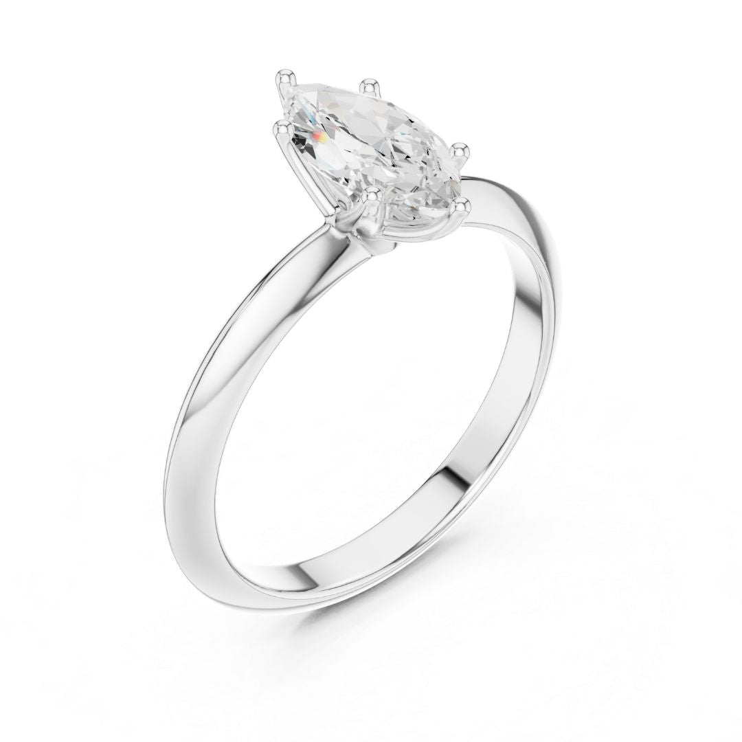 moissanite Diamond ring with a pear-shaped center stone on a white background