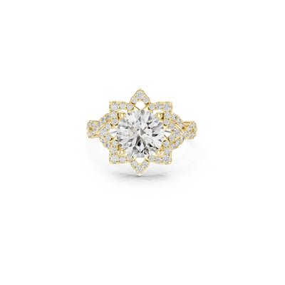 Gold ring with a 1ct moissanite diamond and smaller diamonds on a white background