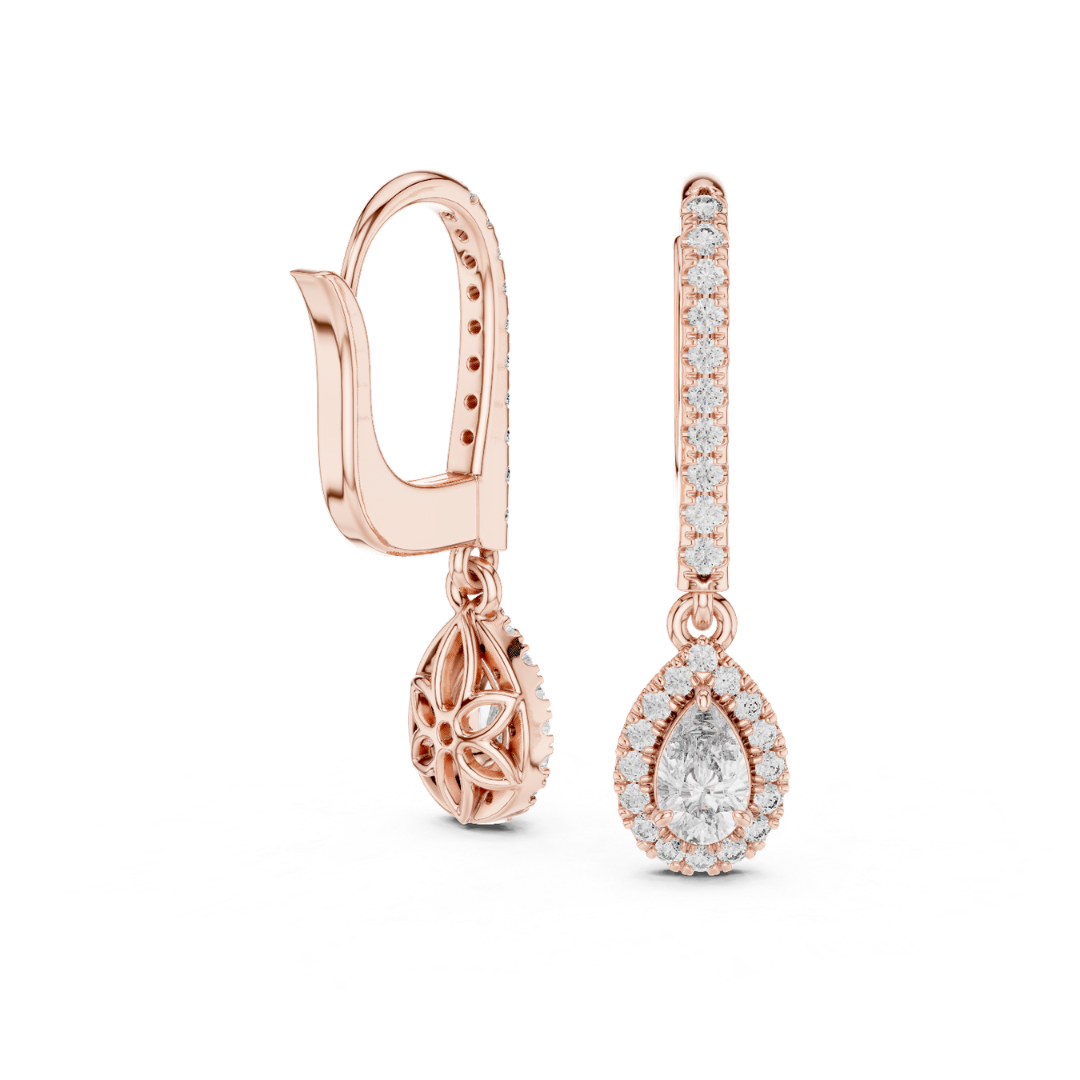 Rose gold earrings with Moissanite diamond accents on a white background