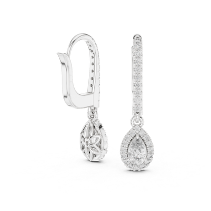 Silver teardrop Moissanite earrings with clear stones on a white background