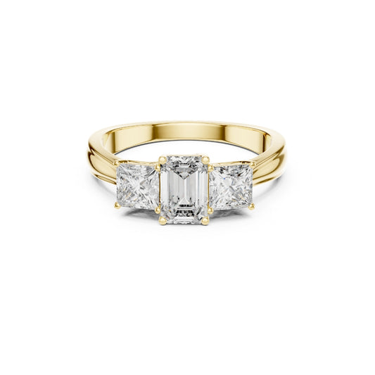 Gold ring with emerald-cut moissanite diamonds on a white background