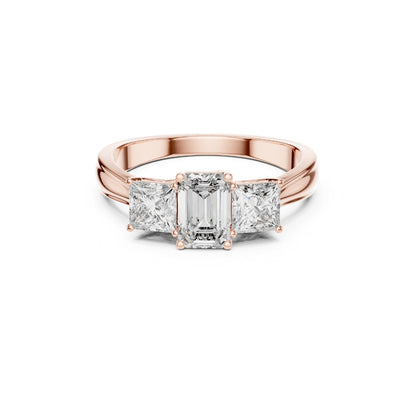 Rose gold ring with emerald-cut moissanite diamond on a white background