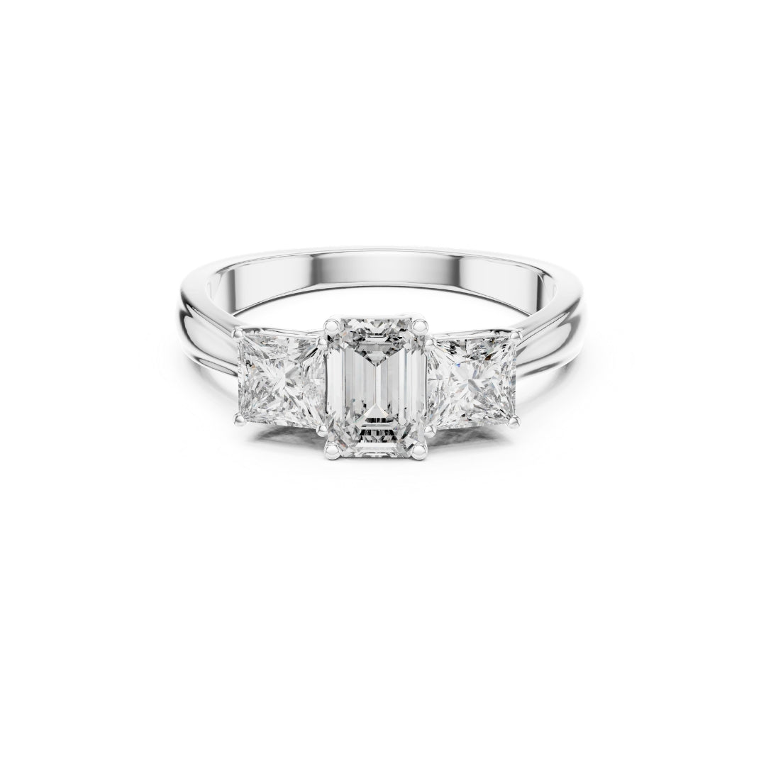 Diamond ring with emerald-cut Moissanite center stone and side stones on a white background