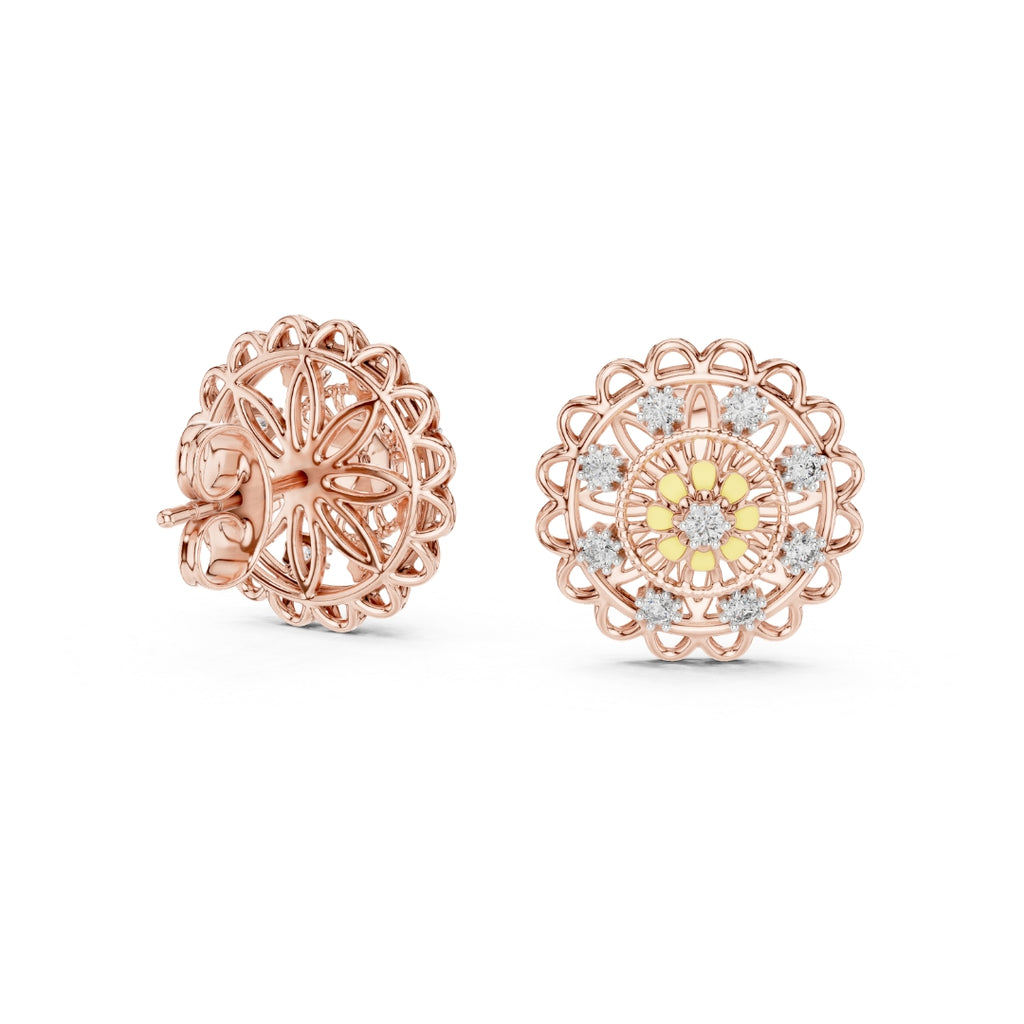 Rose gold earrings with intricate moissanite designs on a white background