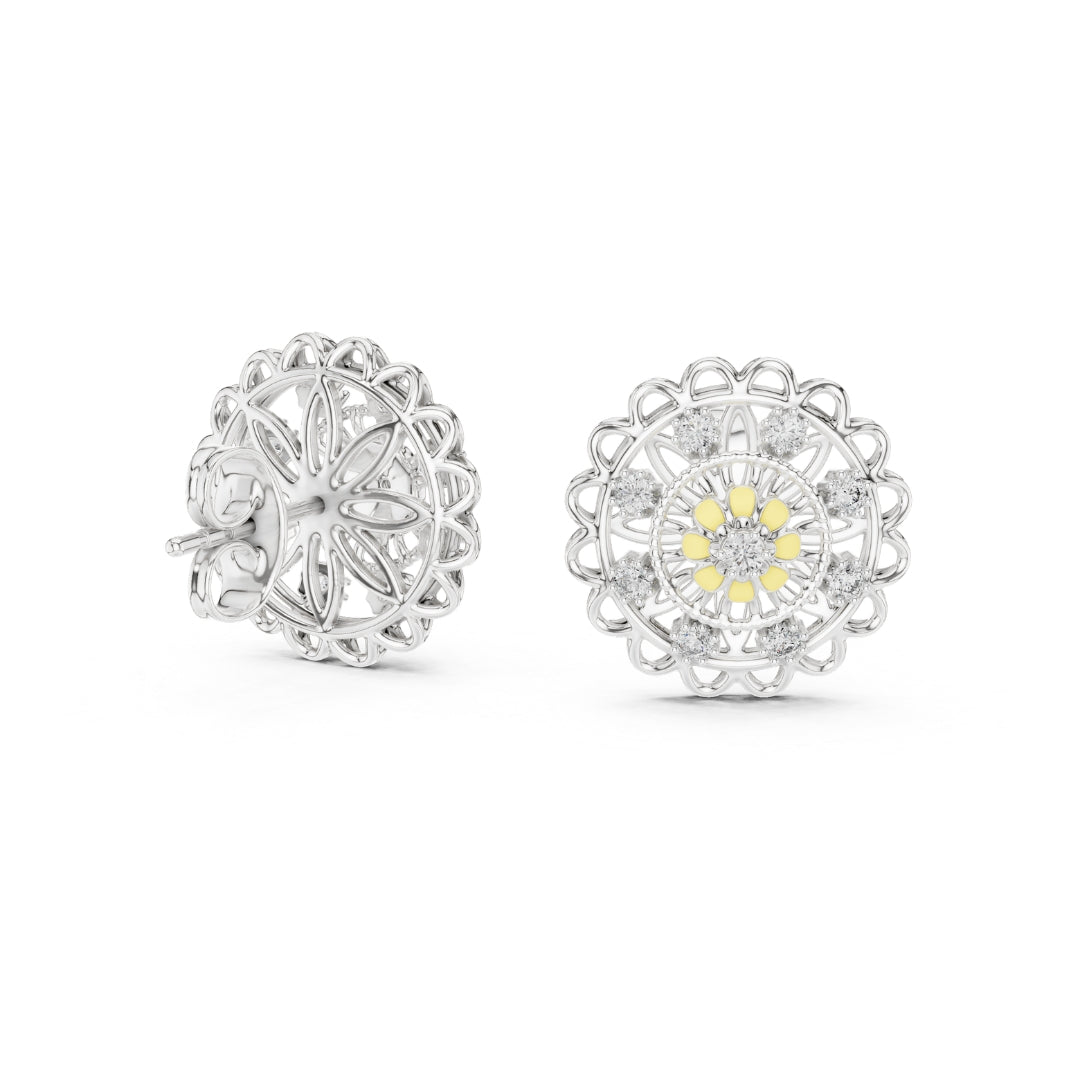 Pair of moissanite silver earrings with intricate designs on a white background