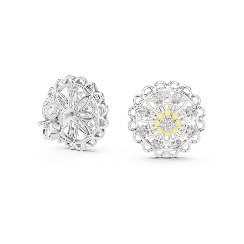 Pair of moissanite silver earrings with intricate designs on a white background